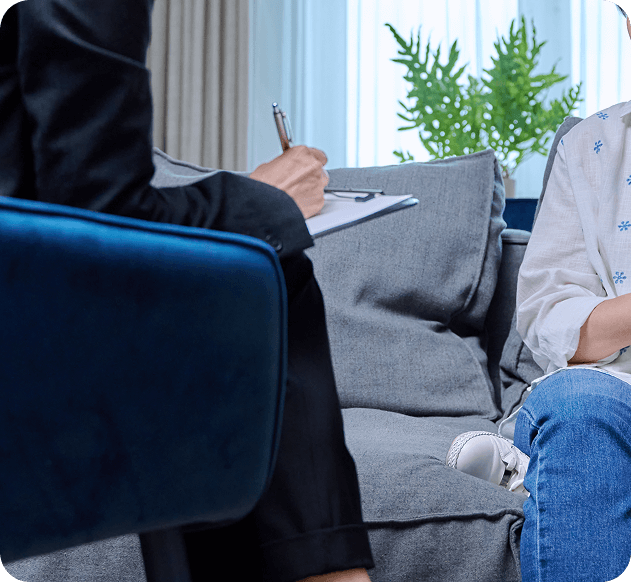 therapist writing down notes